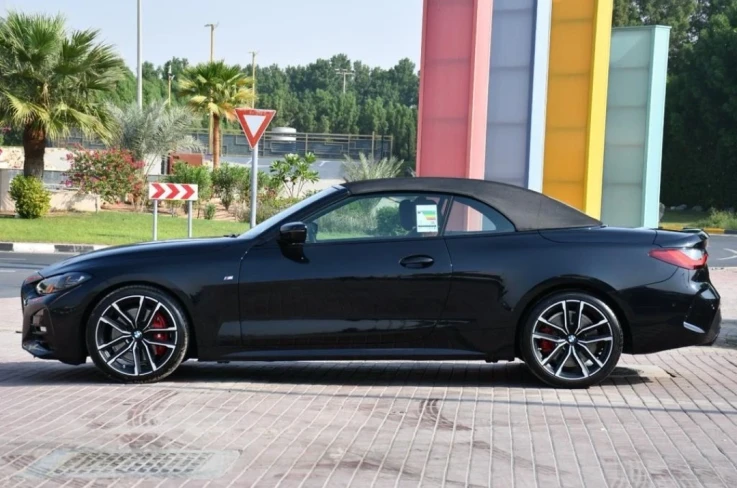 BMW 420 I Convertible 2024 BLACK RENTAL IN DUBAI - undefined